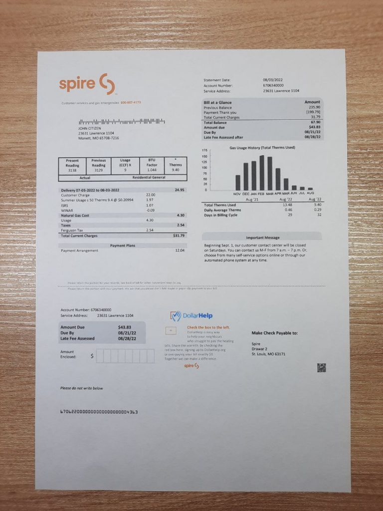 Realistic Missouri Spire gas utility bill photo on desk