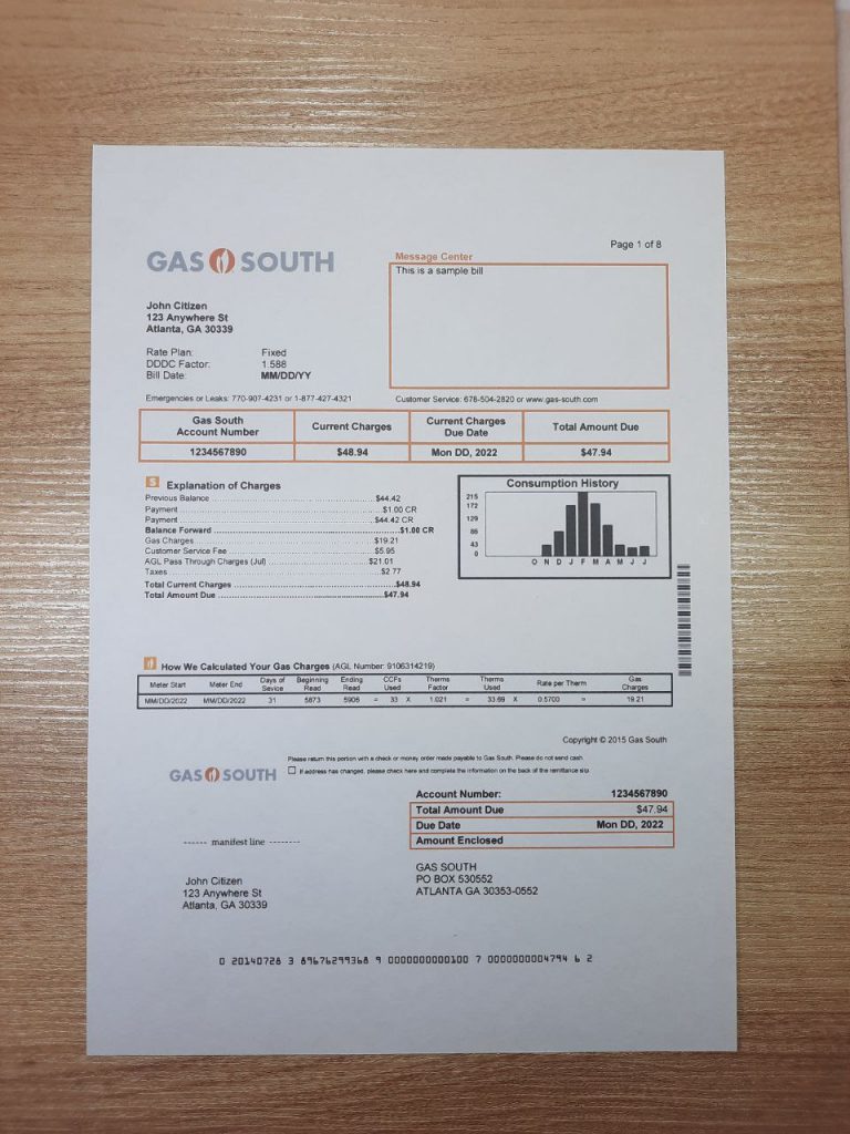  New York Gas South billing statement image on wood surface
