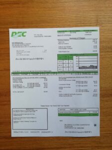 Real photo of Delaware Electric Co-op bill – physical evidence for residence